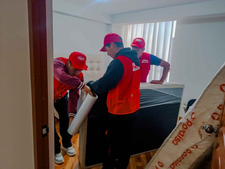 a group of men in red uniforms